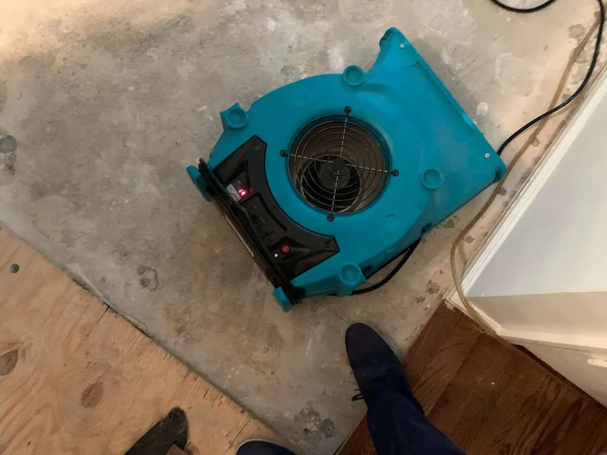 Air mover drying subfloor during Leak Detection & Repair in Shreveport